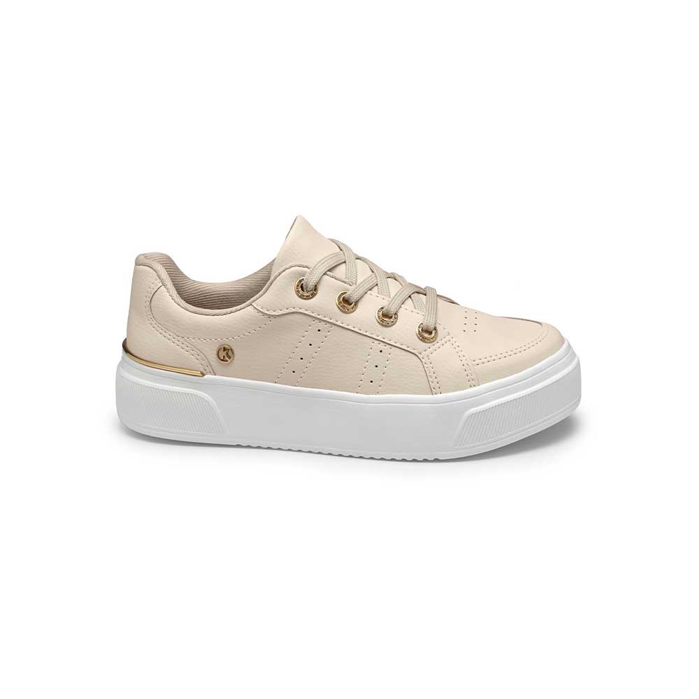 Tenis casual con detalles dorados